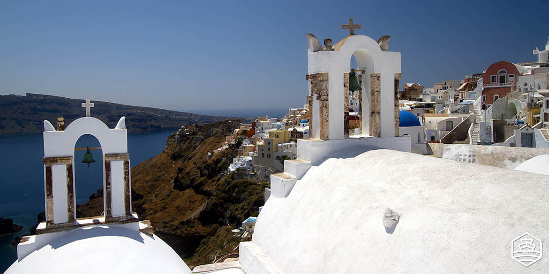 The village of Oia in Santorini and its famous views and churches