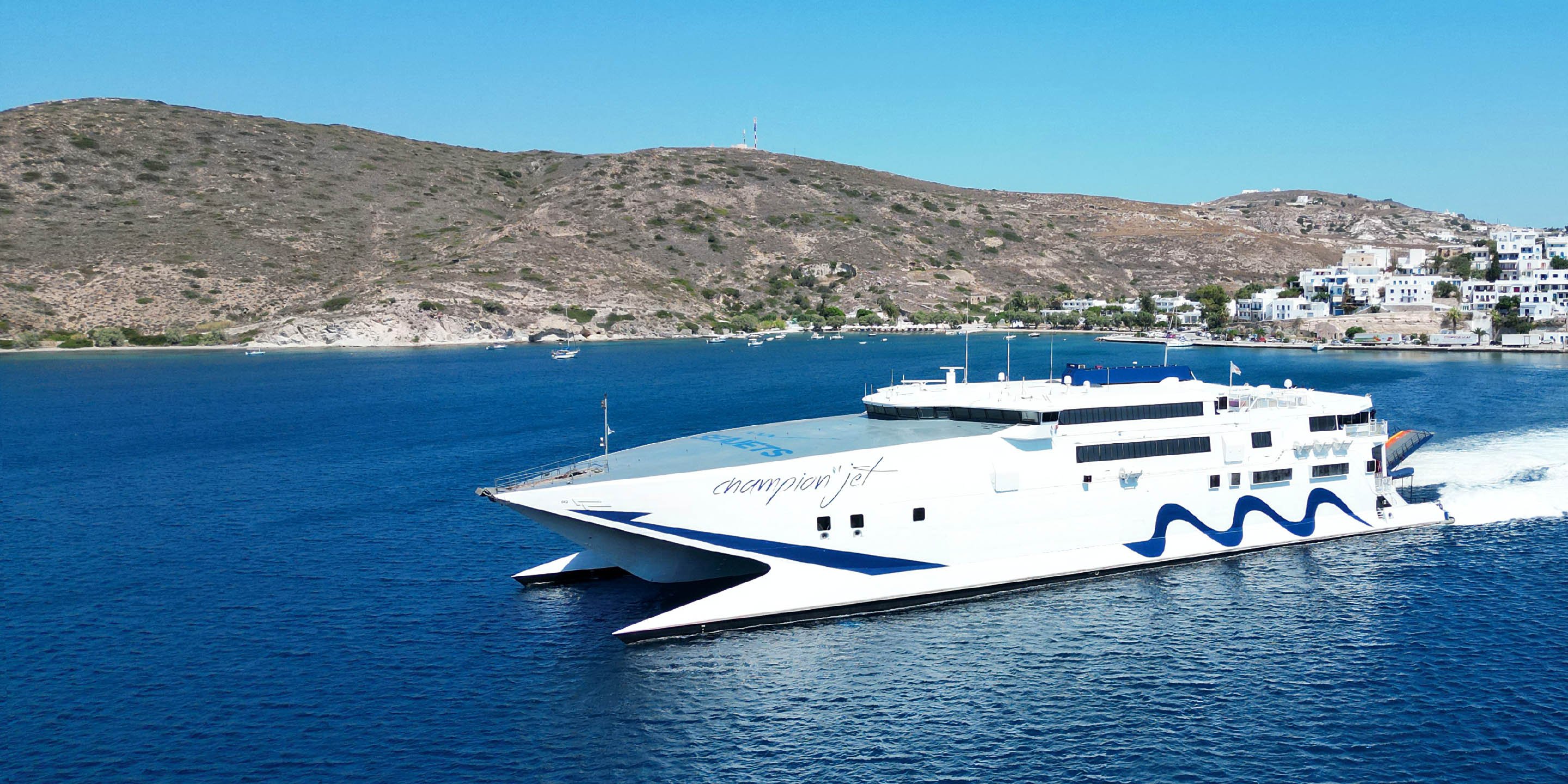 The Champion Jet of Seajets leaving the port of Milos for Santorini